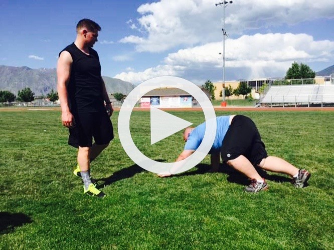 Fitness Camp Participant exercises